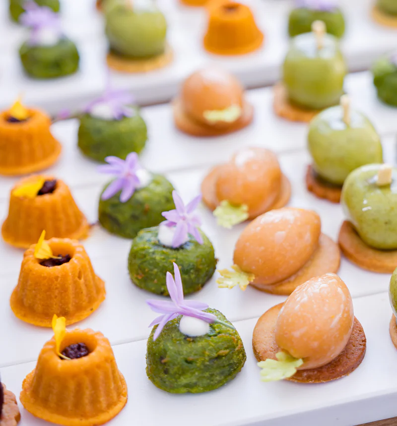 Colourful miniature pastries on a table