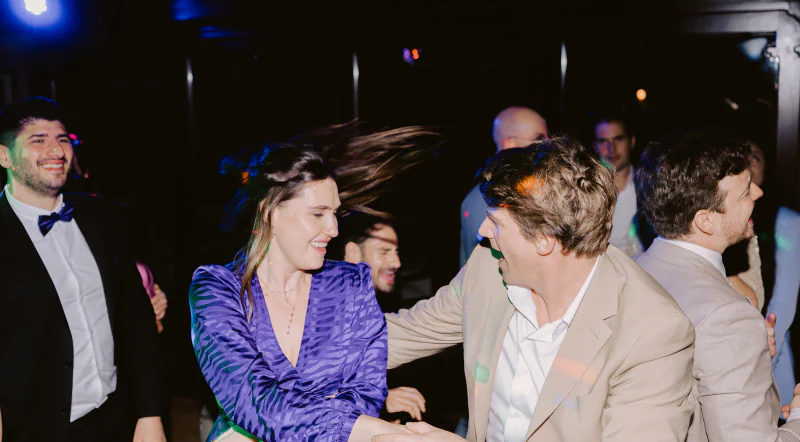 Guests dancing at night